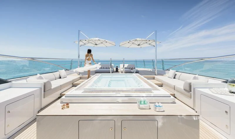 a person sitting on a boat aboard ENTOURAGE Yacht for Sale