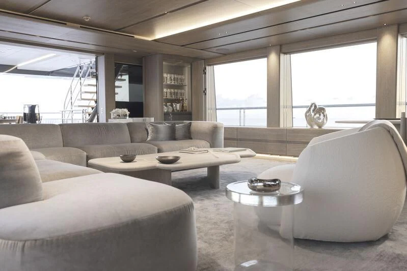 a living room with a large window aboard ENTOURAGE Yacht for Sale
