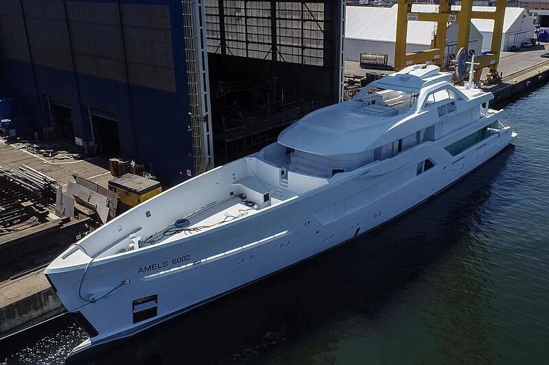 a large white boat docked aboard ENTOURAGE Yacht for Sale