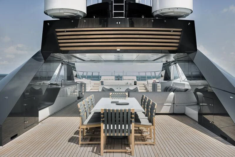 a large building with a large glass window aboard ENTOURAGE Yacht for Sale