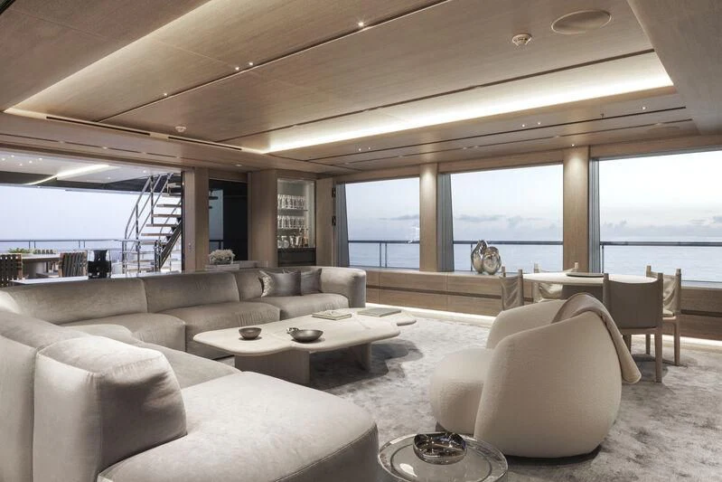 a living room with a large window aboard ENTOURAGE Yacht for Sale