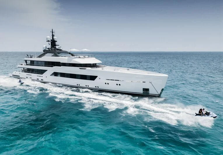 a large white boat in the water aboard ENTOURAGE Yacht for Sale