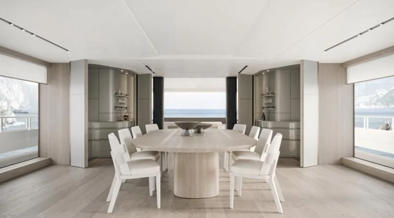a room with a table and chairs aboard ENTOURAGE Yacht for Sale