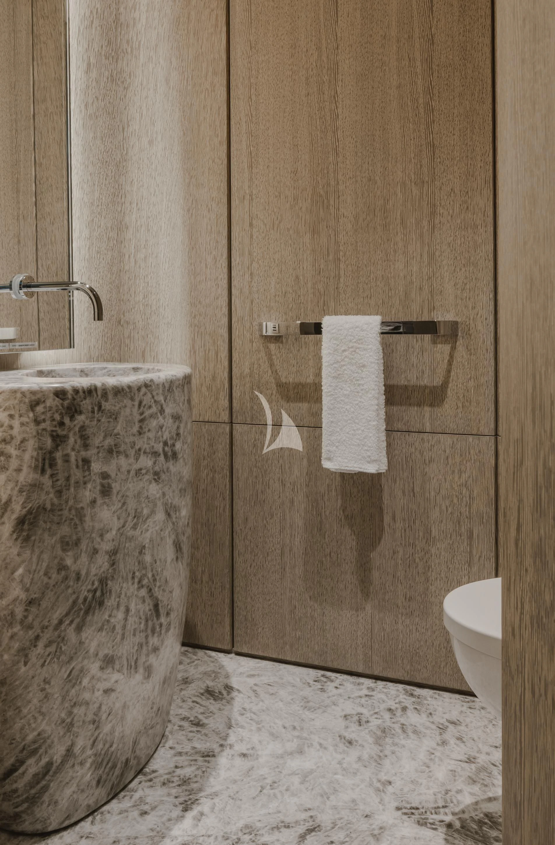 a bathroom with a marble counter top aboard ENTOURAGE Yacht for Sale