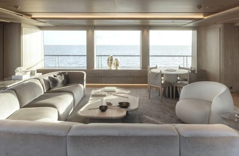 a living room with a large window aboard ENTOURAGE Yacht for Sale