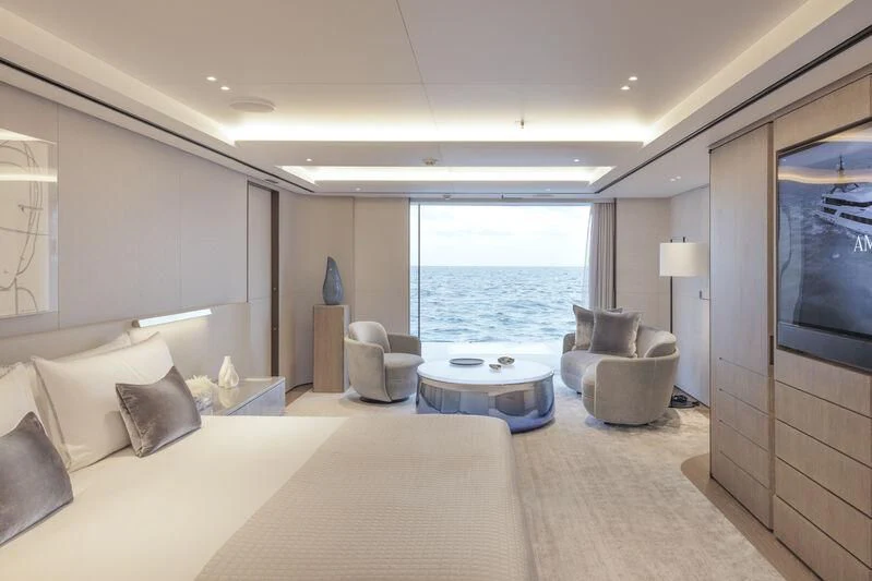 a large hotel room with a large flat screen television and a large body of water aboard ENTOURAGE Yacht for Sale