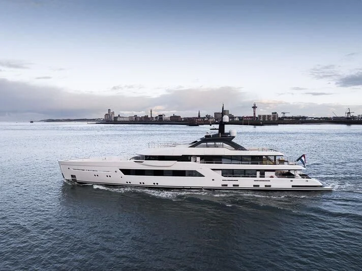 a white yacht in the water aboard ENTOURAGE Yacht for Sale