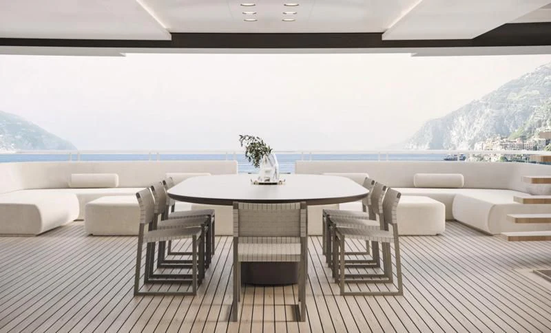 a table and chairs on a deck aboard ENTOURAGE Yacht for Sale
