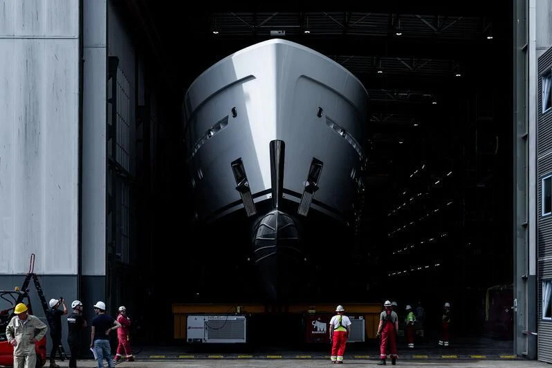a large space ship in a warehouse aboard ENTOURAGE Yacht for Sale