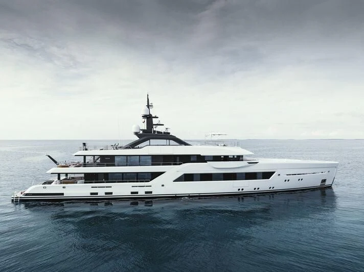 a white yacht in the water aboard ENTOURAGE Yacht for Sale