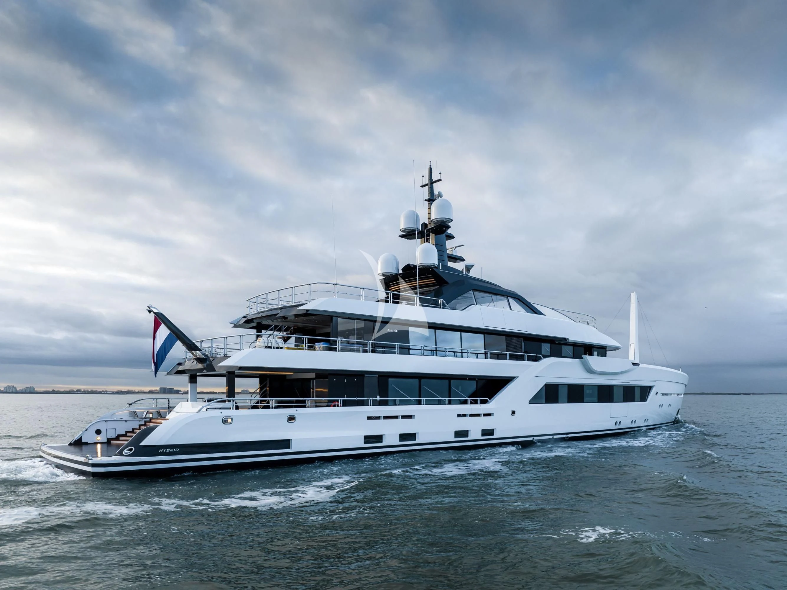 a white yacht in the water aboard ENTOURAGE Yacht for Sale