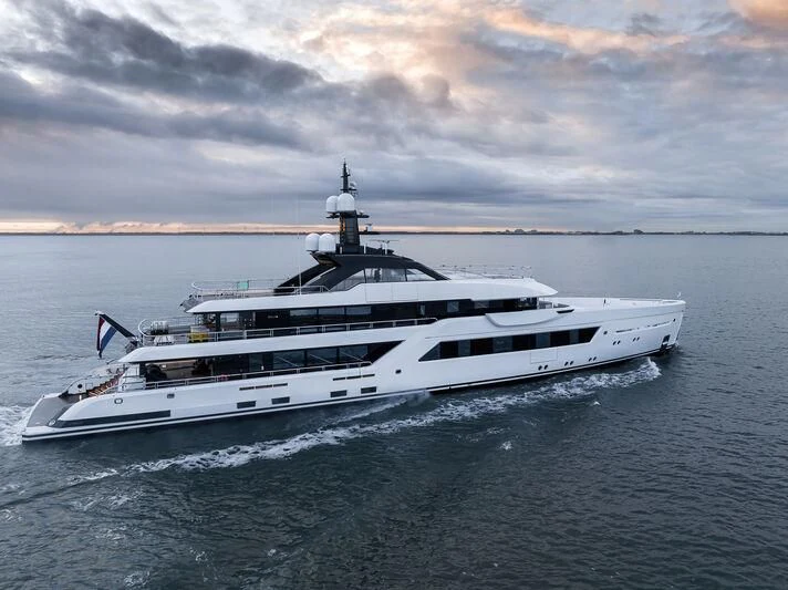 a white yacht in the water aboard ENTOURAGE Yacht for Sale