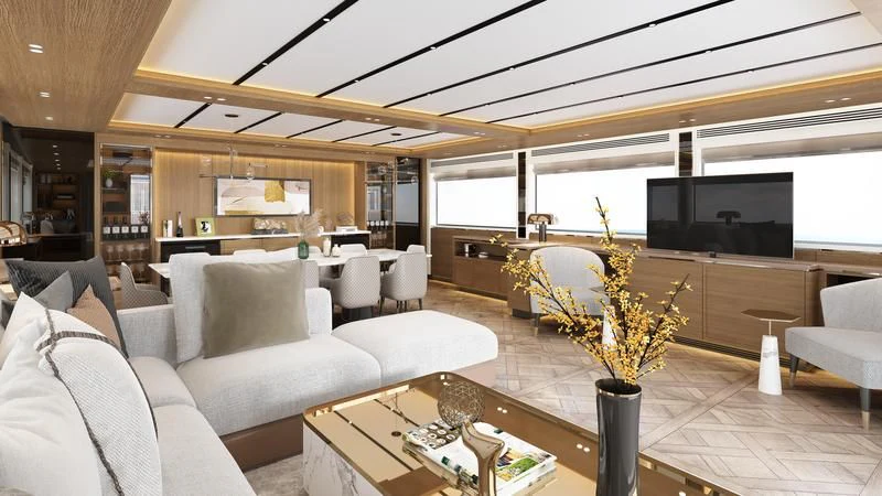 a living room with a large fireplace aboard DESTINATION ONE Yacht for Sale