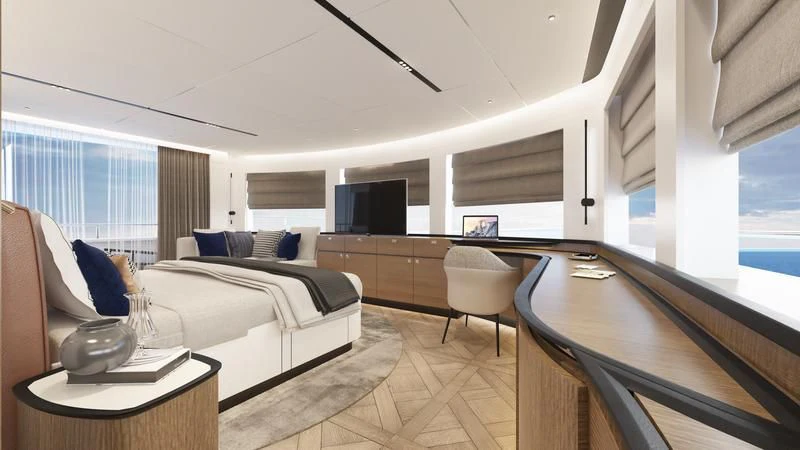 a room with a bed and a table aboard DESTINATION ONE Yacht for Sale