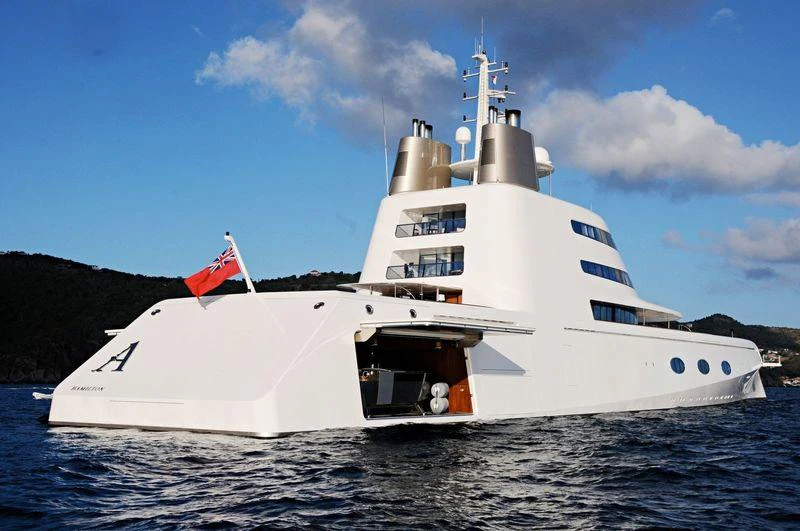 a large white ship aboard A Yacht for Sale