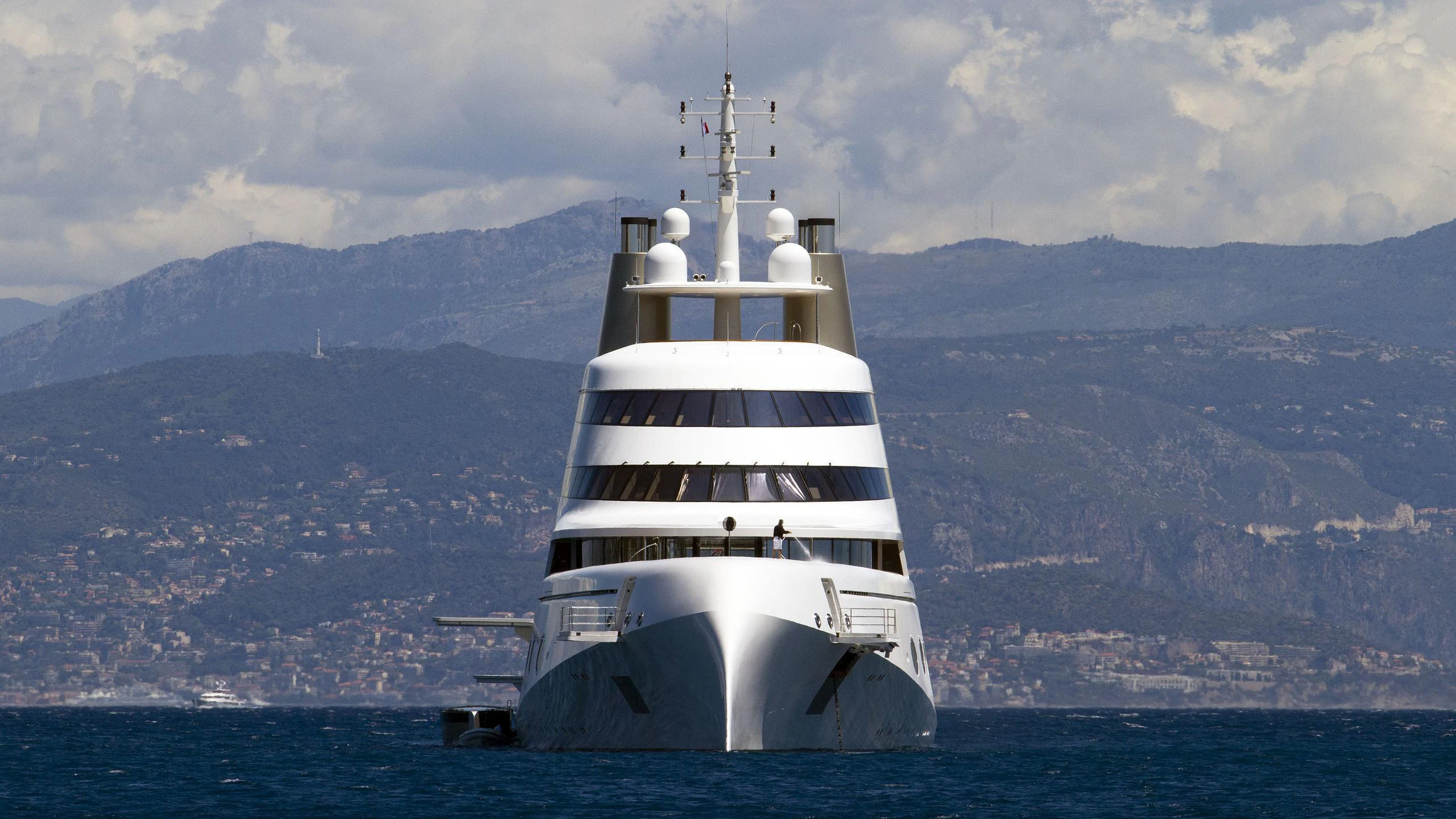 a large white ship in the water aboard A Yacht for Sale