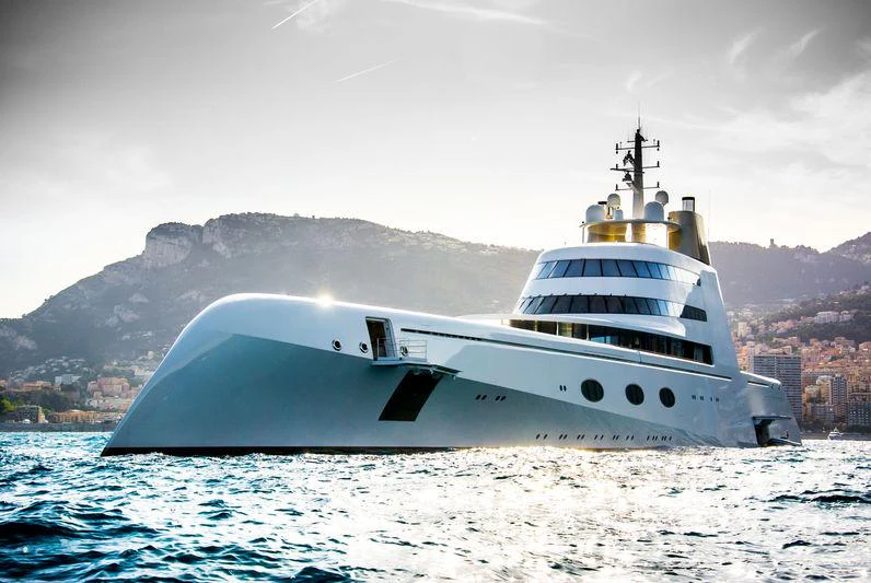 a white ship in the water aboard A Yacht for Sale