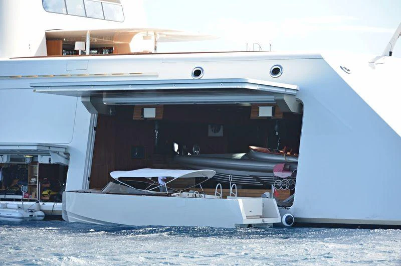 a boat with a deck aboard A Yacht for Sale