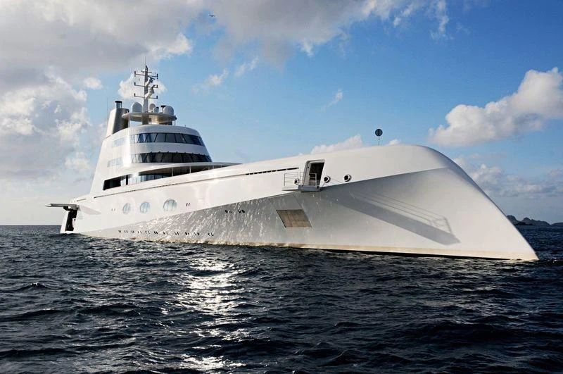 a large white ship in the water aboard A Yacht for Sale
