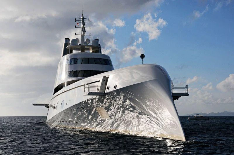 a large white ship in the water aboard A Yacht for Sale