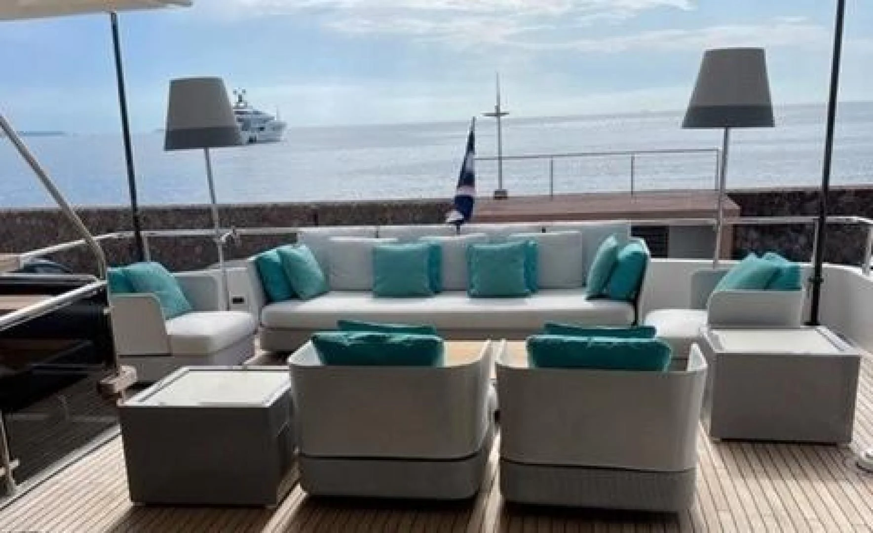 a large living room with a large window overlooking a city aboard ZEN Yacht for Sale