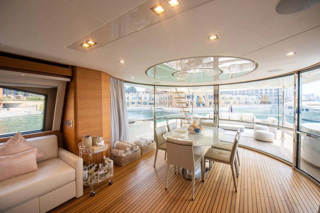a room with a table and chairs aboard ZEN Yacht for Sale