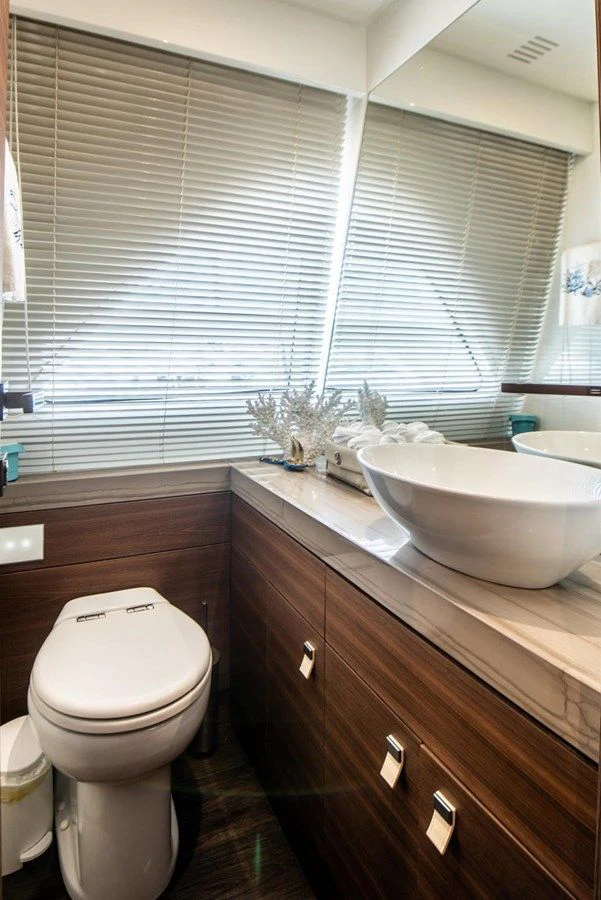 a bathroom with a sink and a toilet aboard ZEN Yacht for Sale