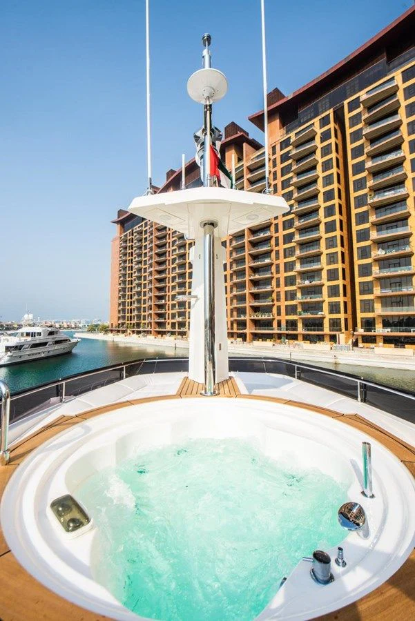 a pool in front of a building aboard ZEN Yacht for Sale