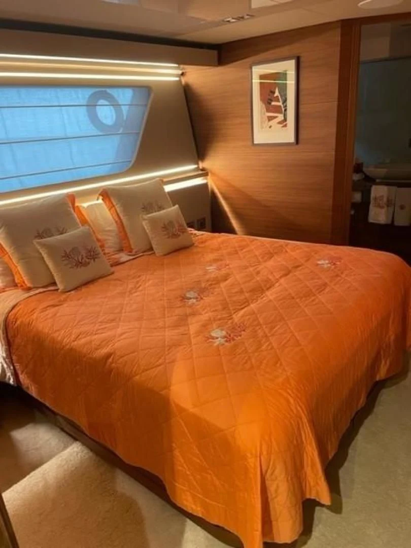 a bed with a pillow aboard ZEN Yacht for Sale