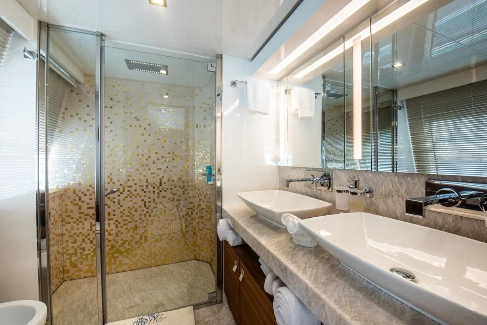 a bathroom with a large glass shower aboard ZEN Yacht for Sale