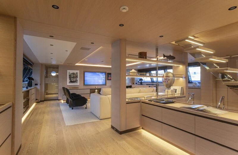 a large kitchen with a large window aboard CAOZ 14 Yacht for Sale