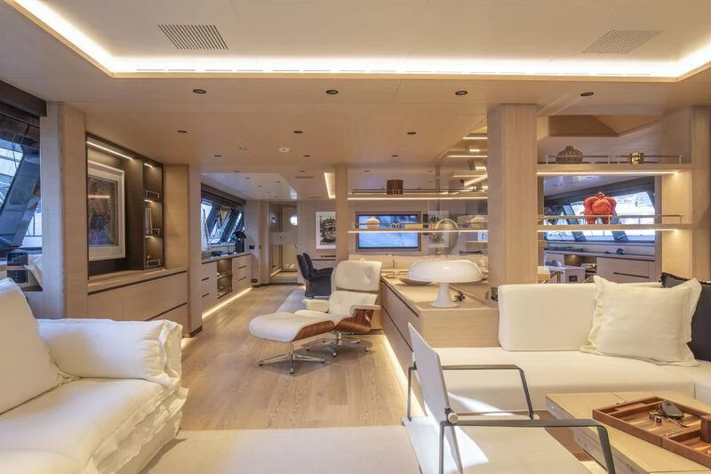 a living room with a large window aboard CAOZ 14 Yacht for Sale