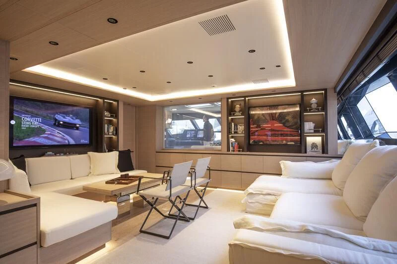 a living room with a large screen aboard CAOZ 14 Yacht for Sale