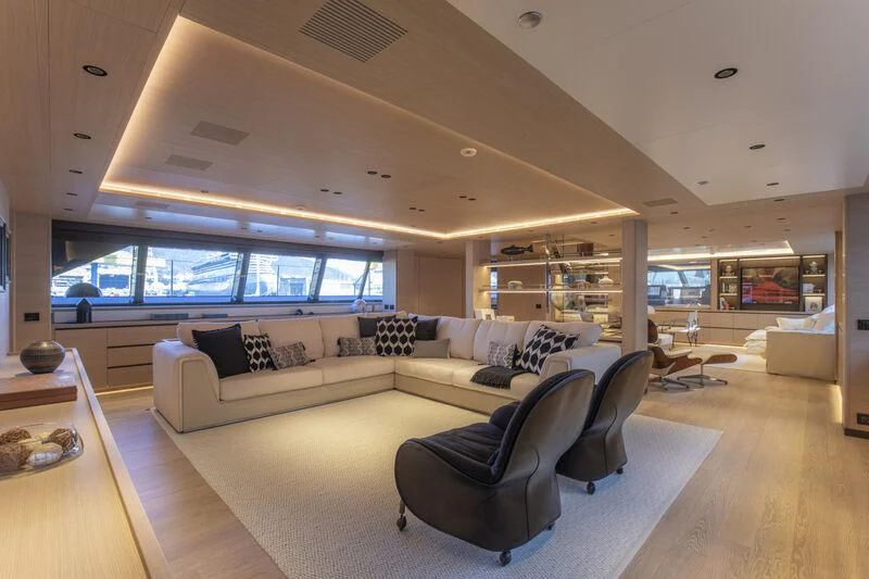 a living room with a large window aboard CAOZ 14 Yacht for Sale
