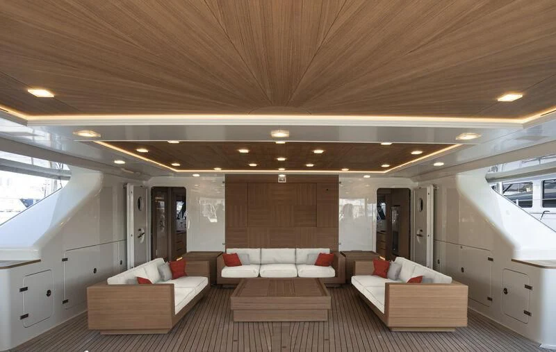 a large room with a couch and a table aboard CAOZ 14 Yacht for Sale