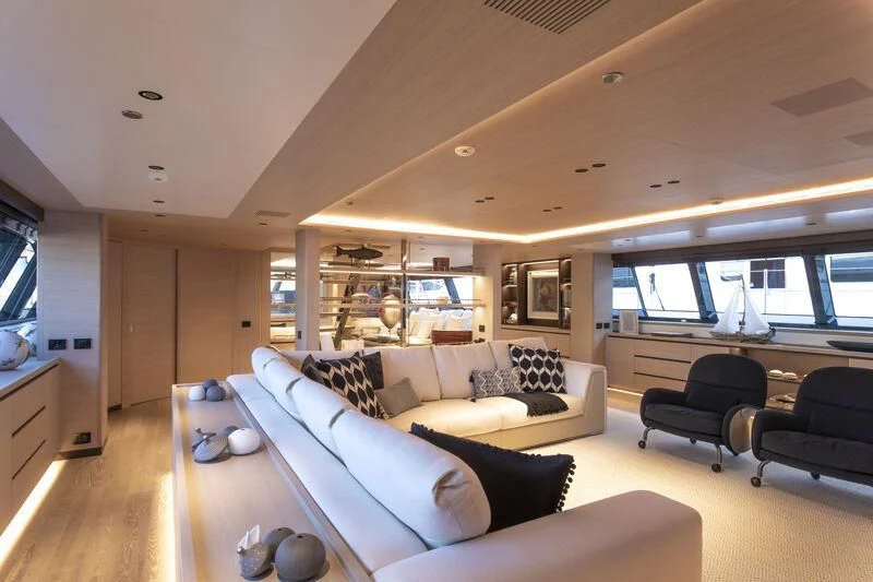 a living room with a large window aboard CAOZ 14 Yacht for Sale