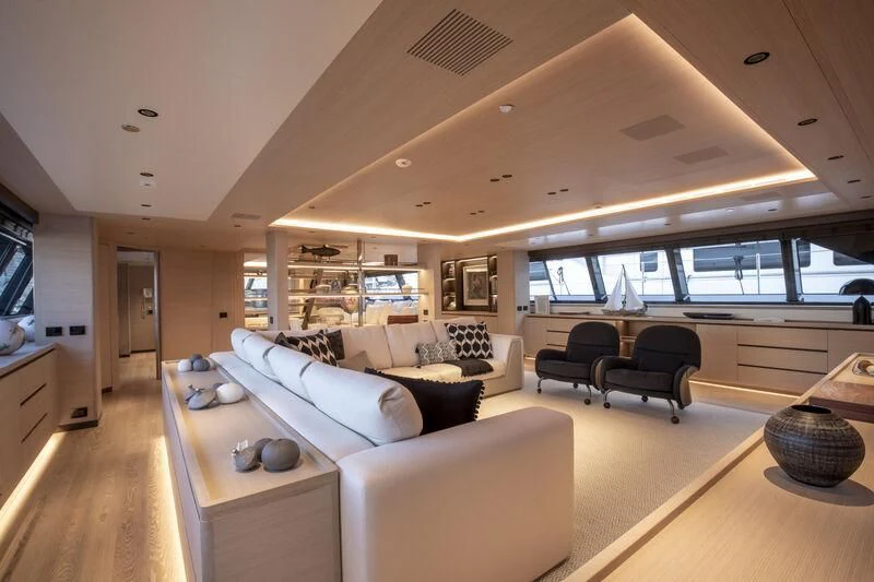 a living room with a large window aboard CAOZ 14 Yacht for Sale