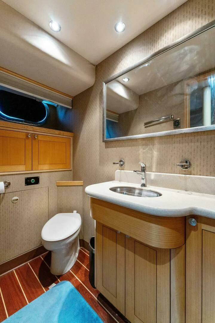 a bathroom with a sink and a toilet aboard ANTARES Yacht for Sale