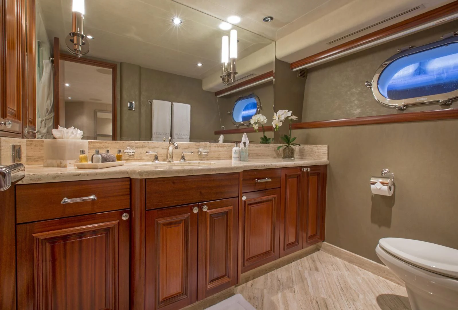 a bathroom with a large mirror aboard ANTARES Yacht for Sale