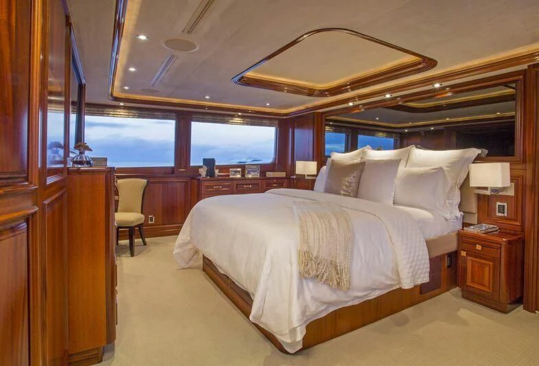 a bed in a room aboard ANTARES Yacht for Sale
