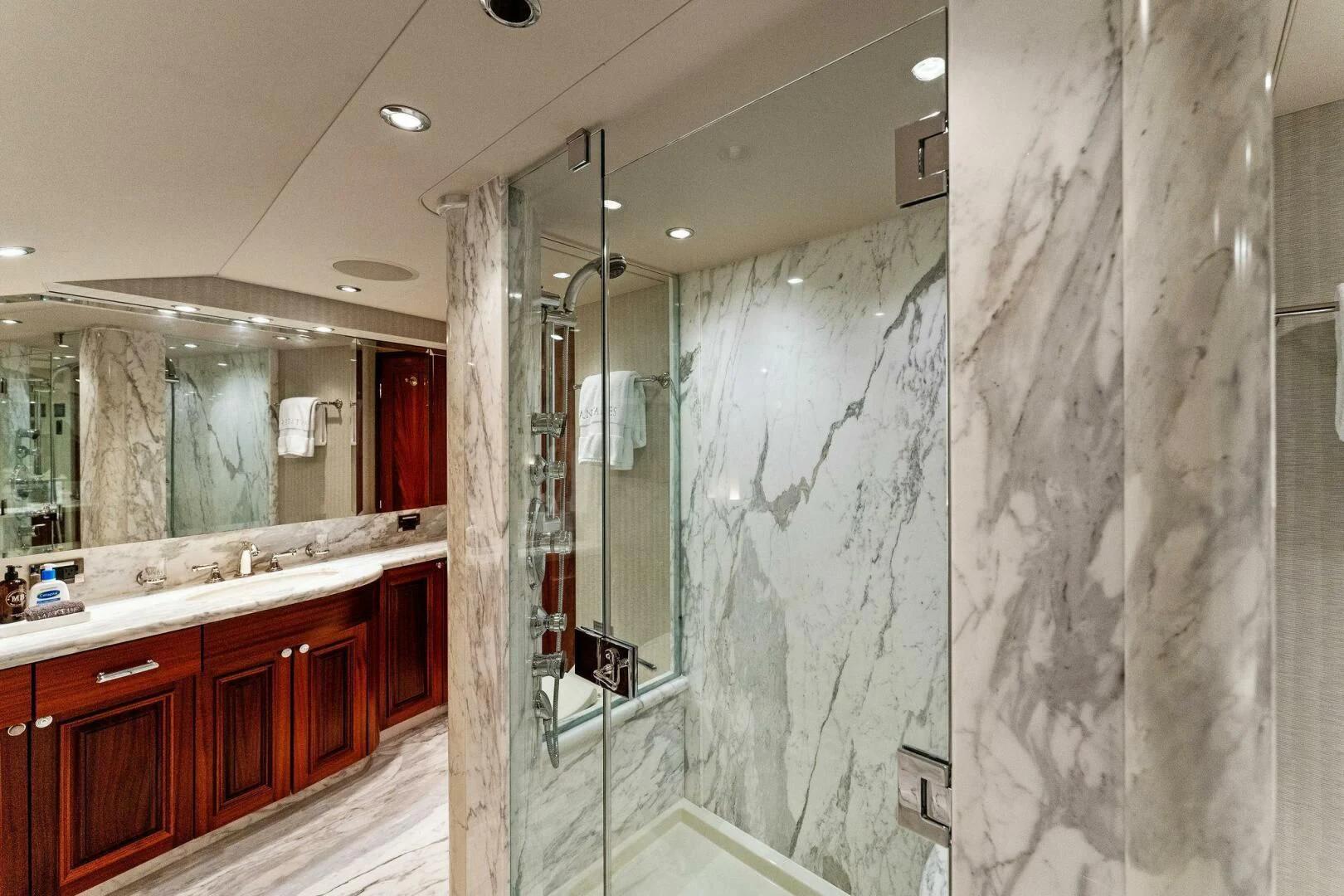 a bathroom with a shower curtain aboard ANTARES Yacht for Sale
