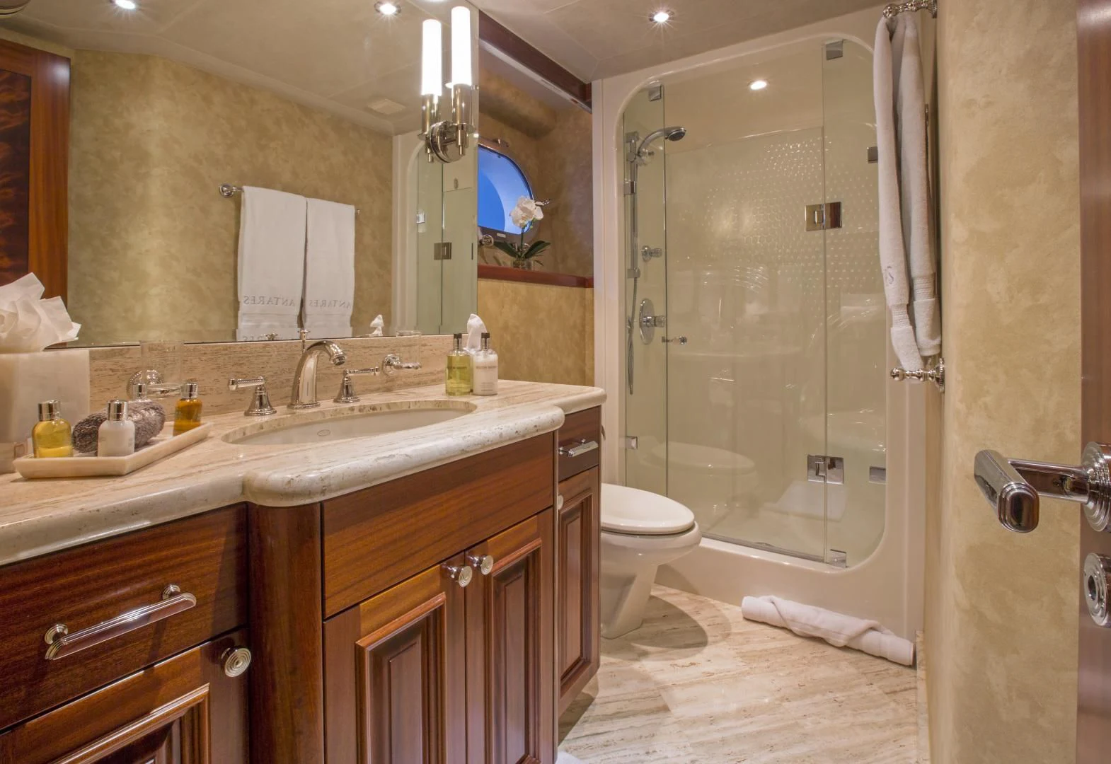 a bathroom with a shower and sink aboard ANTARES Yacht for Sale