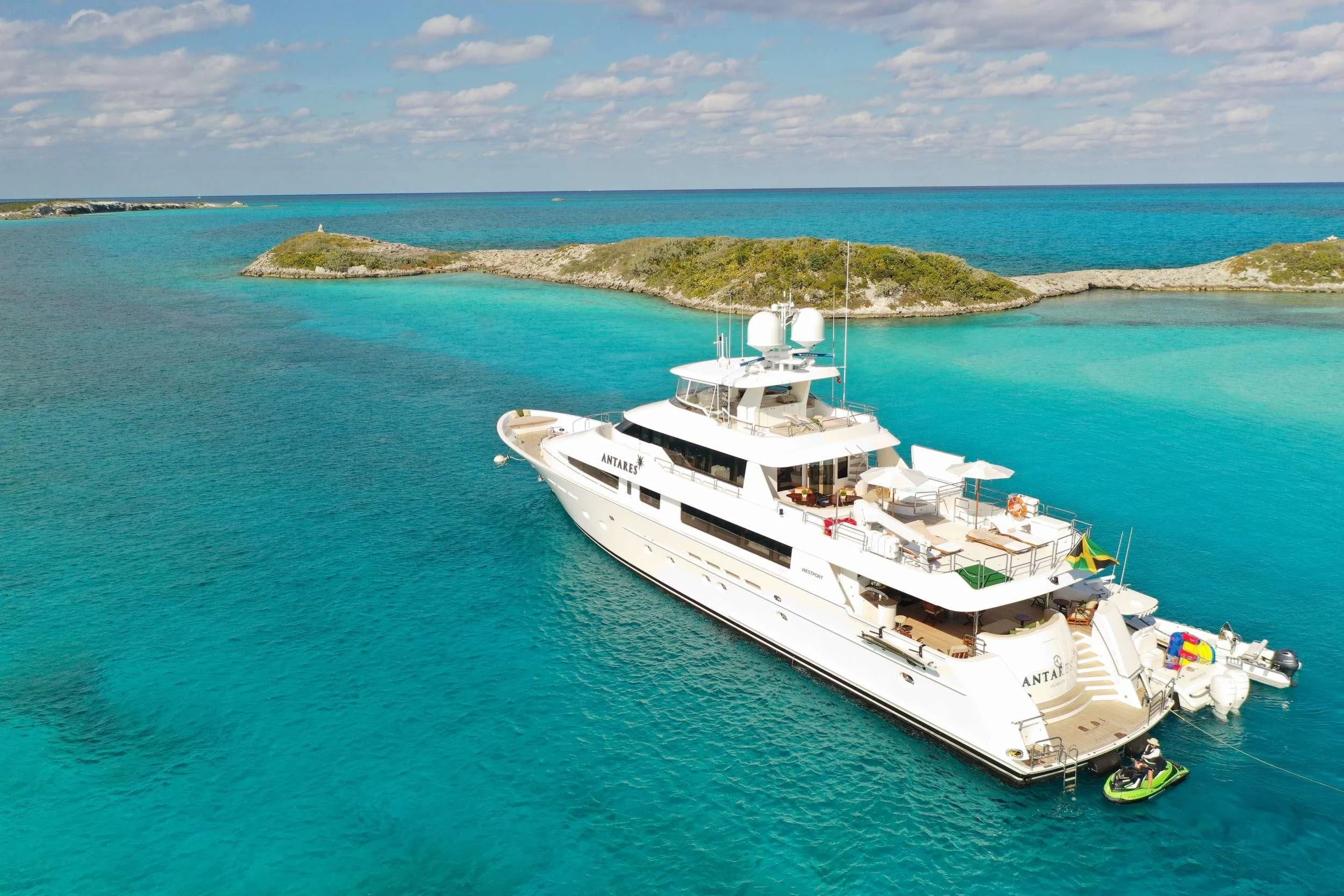 a large white ship in the water aboard ANTARES Yacht for Sale