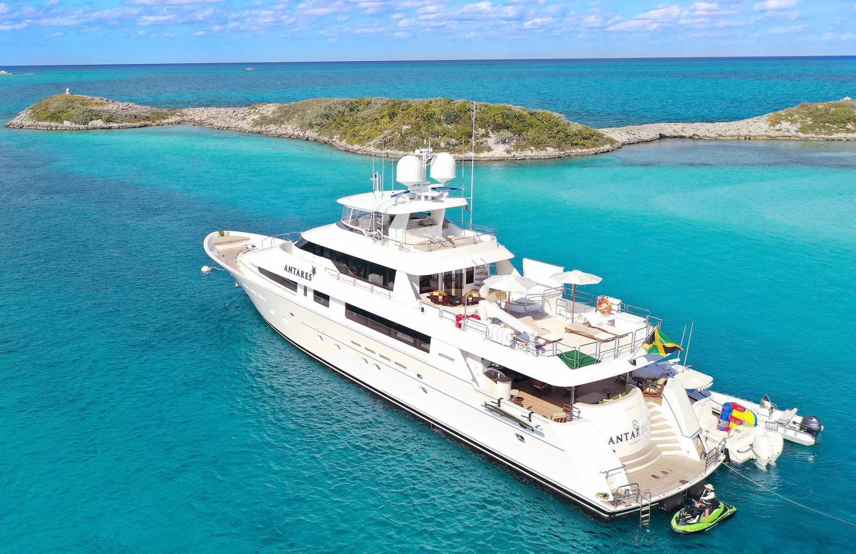 a large white ship in the water aboard ANTARES Yacht for Sale