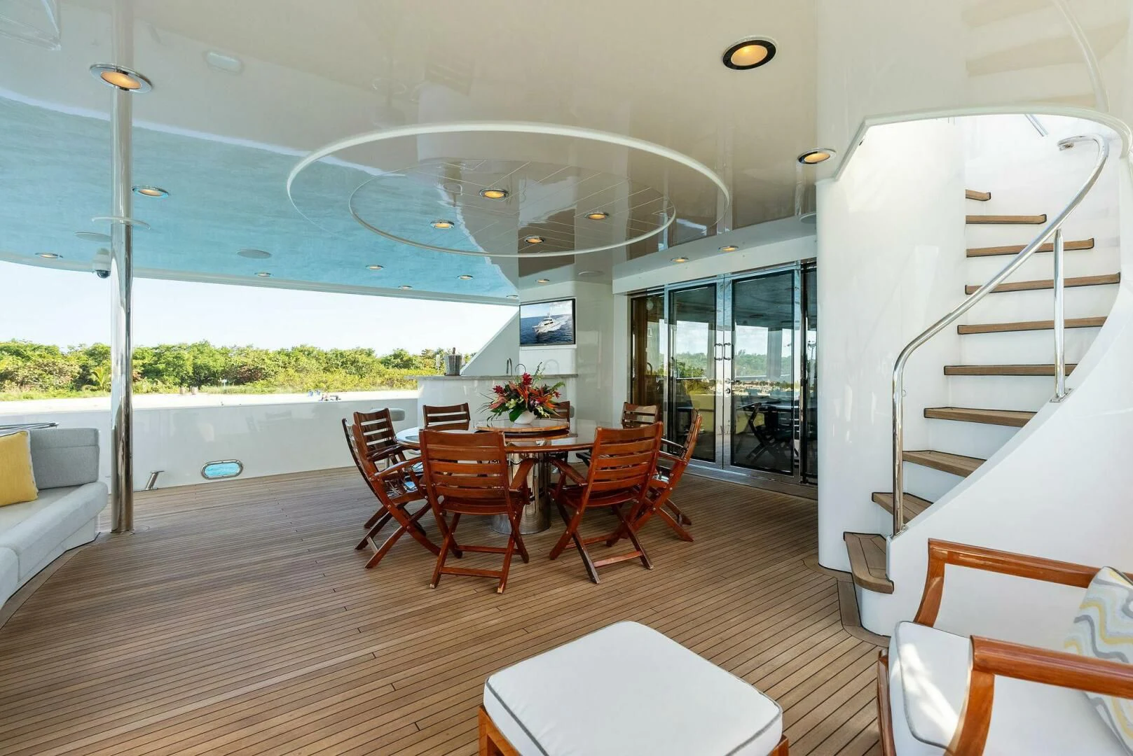 a room with tables and chairs aboard ANTARES Yacht for Sale