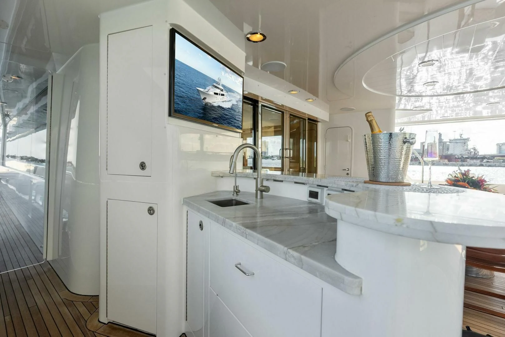 a kitchen with a large window aboard ANTARES Yacht for Sale