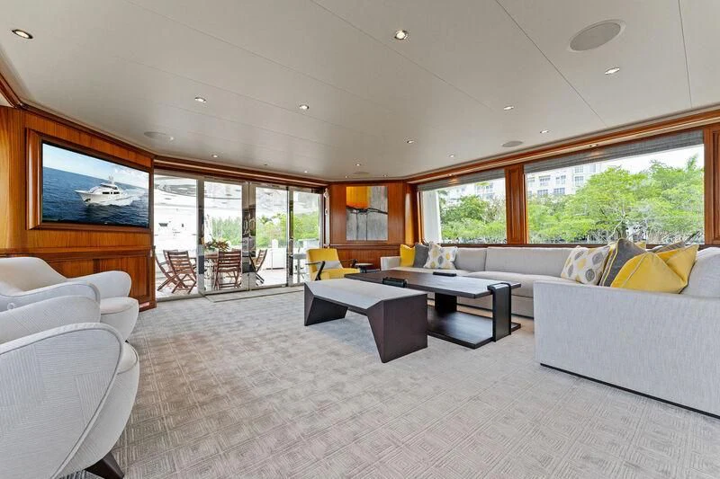a living room with a couch and a table aboard ANTARES Yacht for Sale