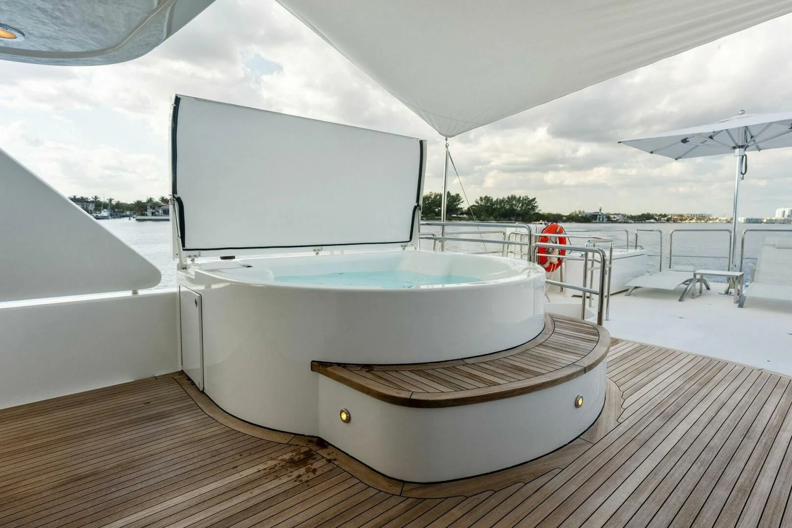 a large white boat on a dock aboard ANTARES Yacht for Sale