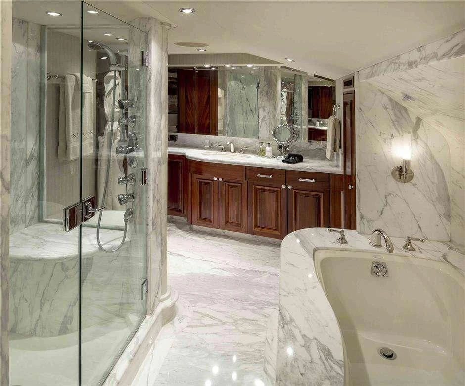 a bathroom with a glass shower aboard ANTARES Yacht for Sale
