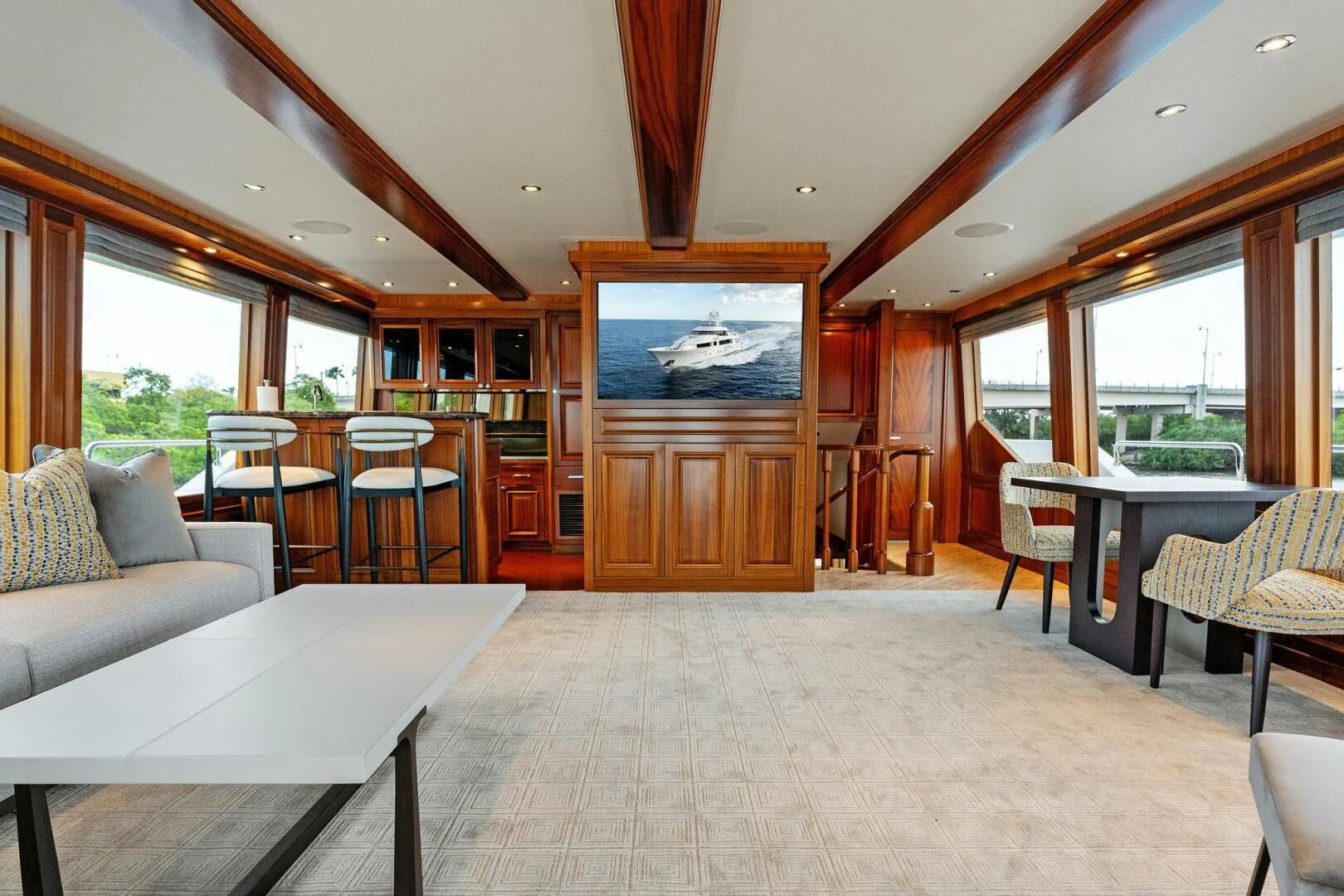a room with a table and chairs aboard ANTARES Yacht for Sale